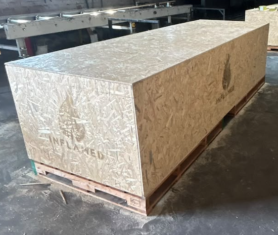 A completed Inflamed timber order protected in a timber shipping crate